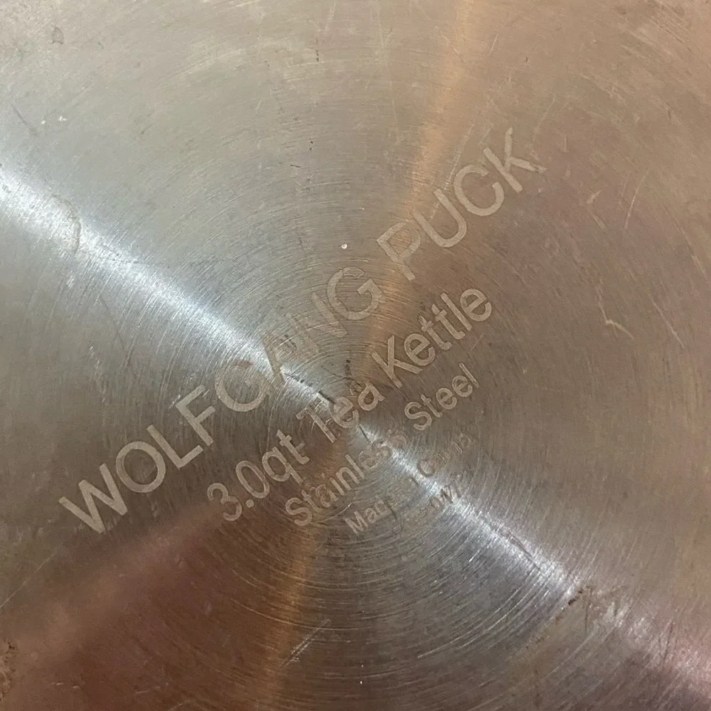 Polished Silver Kettle with Wooden Accents